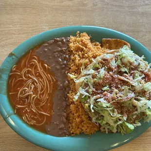 No meat plate (I think is what it was called) tostada, cheese enchilada, fideo, beans and rice