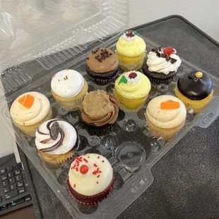 a tray of cupcakes