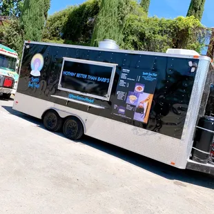 a food truck parked in a parking lot