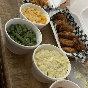 Trio combo fried chicken, shrimp &amp; fish. Green beans, potato salad &amp; peach cobbler