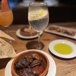 Gintonic, gambas, Chicken  Jamón Croquettes, bacon-wrapped dates, Guns &amp; Rosés