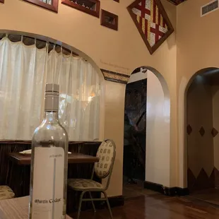 a bottle of wine on a table
