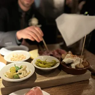 Charcuterie and potatoes bravas