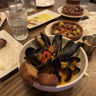 Steamed mussels are fantastic! Homemade Marinated olives very delicious