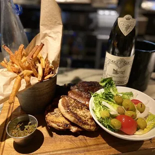 Parillada Barcelona: NY Strip, Chicken, Pork Loin and Chorizo. Fries and salad