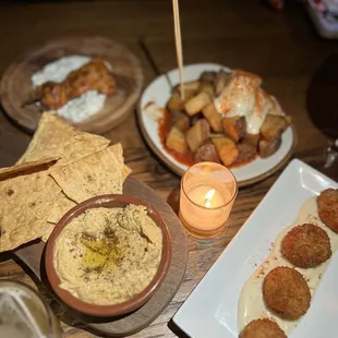 Hummus, potatoes, chicken thigh