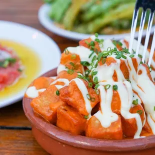 a plate of food with a fork in it