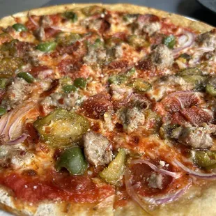 Rallier - supreme with gluten free crust. Awesome GF crust.