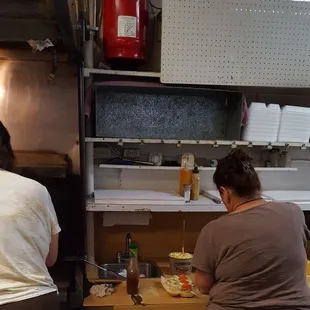 two women preparing food