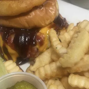 a burger and fries on a plate