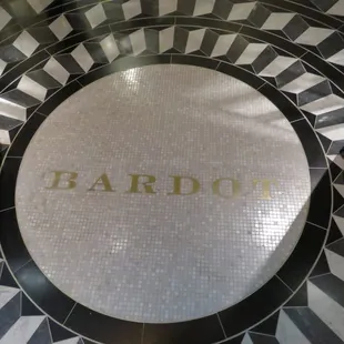 The floor inside the main door.