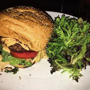 The Lamb Burger with a side salad and honey mustard vinaigrette