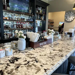 a bar with a marble counter top