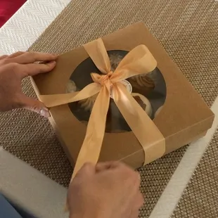 Cake tasting box wrapped in a cute bow!