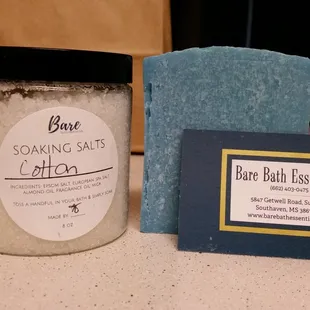 Cotton scent soap bar and bath salts.