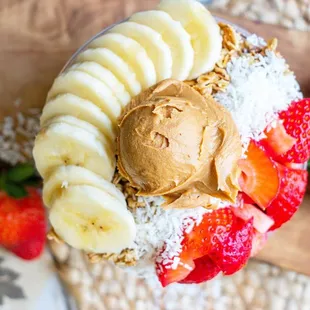 a banana, strawberries, and peanut butter