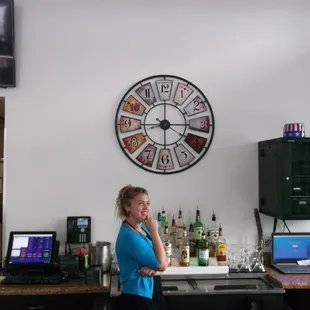 a woman sitting at a bar