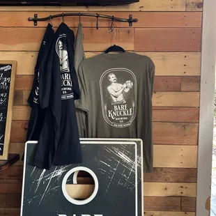 Hoodies and shirts for sale.