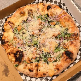 Spinach, mushroom, becoming and parmesan with red onion.and sausage added ~ nice light crust