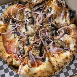 The Roman. Delicious!! sausage, sliced red onion, and mushrooms.