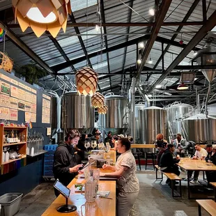 two women serving drinks