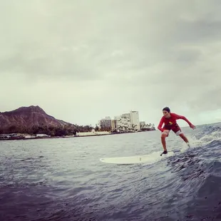 Our Noah catching a surf break. Photo by Ohana Surf