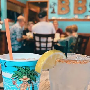 a glass of lemonade and a drink