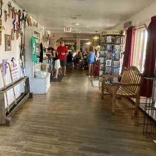 people walking through the store