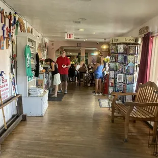 people walking through the store