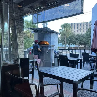 Wood fired pizza oven in action