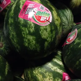 a large pile of watermelons