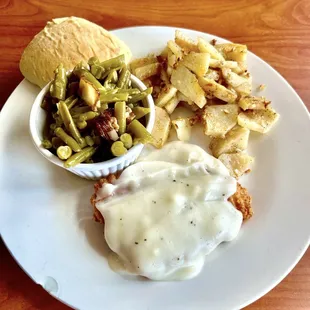 Chicken fried chicken, green beans with bacon, German fries and a roll. $7.99 !
