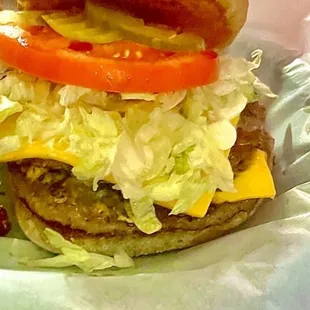 An amazing double burger with cheese !