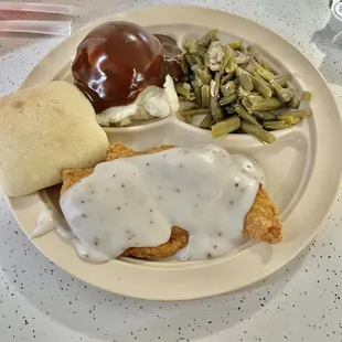 Chicken fried chicken with mashed potatoes, green beans and biscuit ! Yum !