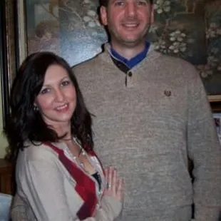a man and woman posing for a picture