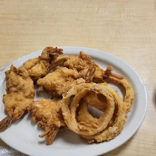 a plate of fried onion rings