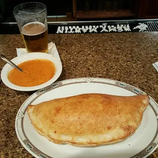 pepperoni calzone with pink sauce instead of marinara... YUM!