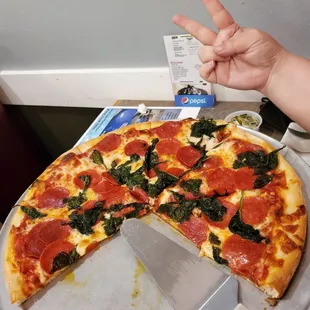 a pizza with a slice missing