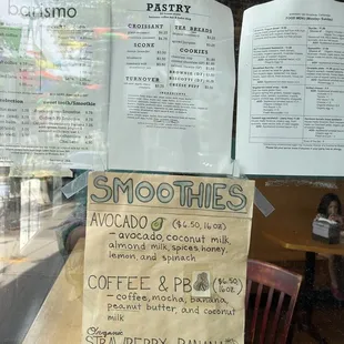 menus on the window of a coffee shop