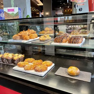 Pastry case with yummy goodies to accompany your latte YUM