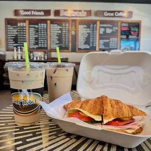 Cold croissant sandwich; Pesto Mayo, Turk, ham, Tom, cucumbers, pepercini, pickles , pepper jack cheese  Coldbrew coffee with coffee cubes