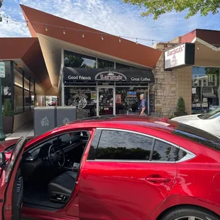 My car and a happy customer relaxing sitting outside
