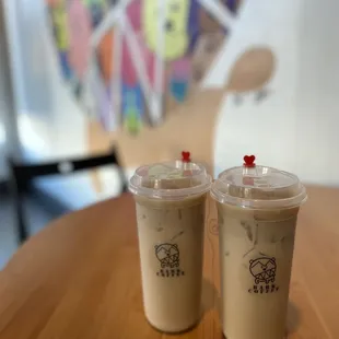 two cups of coffee on a table
