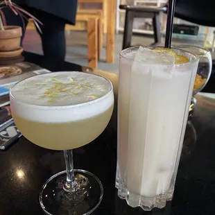 two cocktails on a table
