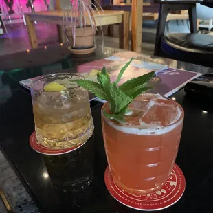 two cocktails on a table