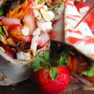 a burrito with strawberries