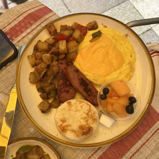 Barking dog combo. It came with eggs, meat, home fries and a biscuit. Everything was great besides the biscuit.