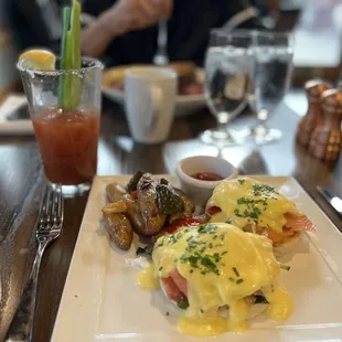 Eggs Benedict with smoked salmon and a Bloody Mary cocktail