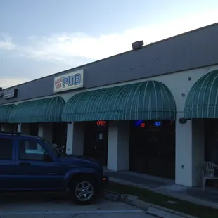 a car parked in front of a building
