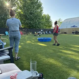 The large outdoor area for the dogs and the people who enjoy them.